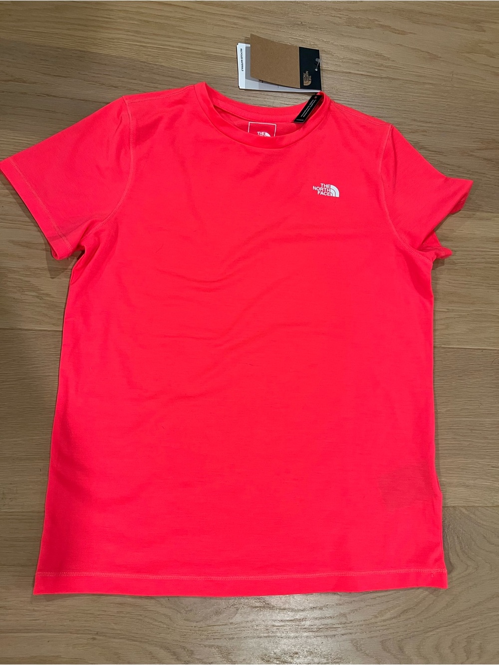 The North Face womens Short Sleeve Tee in radiant poppy XS